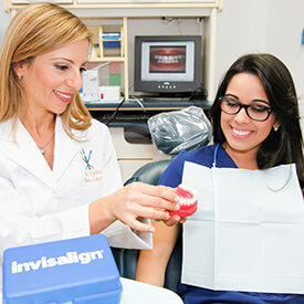 Dr. Natalia with happy smiling patient